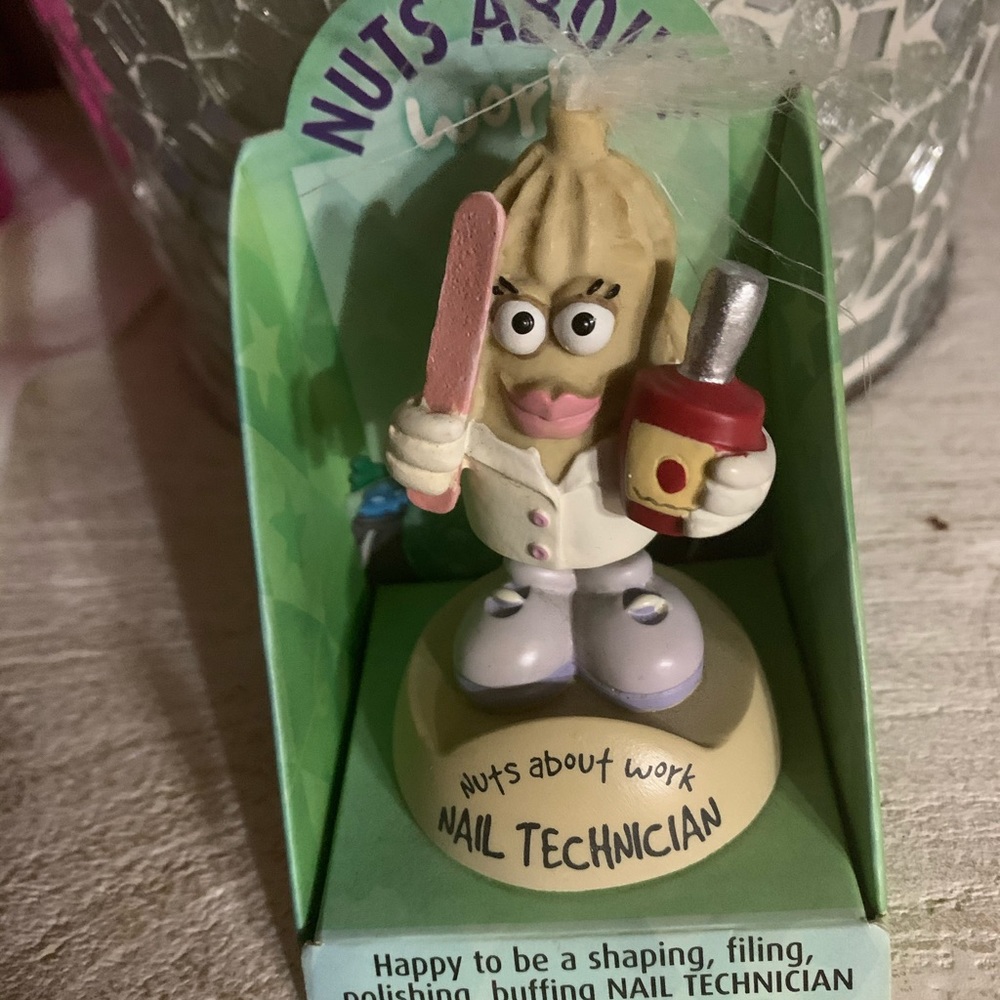 Nail technician figurine
